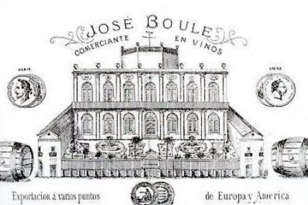 Una de les etiquetes de vins del Boule, il·lustrada amb el Palau Boule, actual Escola Maria Cortina.